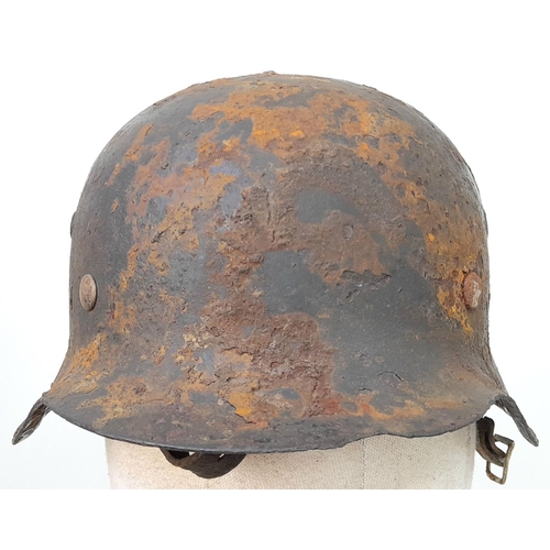 180 - WW2 German Luftwaffe M42 Helmet. found near Bayeux, Normandy, France.