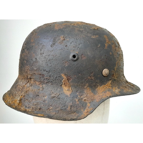 180 - WW2 German Luftwaffe M42 Helmet. found near Bayeux, Normandy, France.