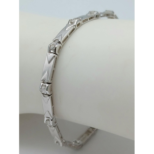 186 - A 18K WHITE GOLD 0.50CT DIAMOND BRACELET. TOTAL WEIGHT 8.6G. TOTAL LENGTH 17.5CM. REF MECH 22 1