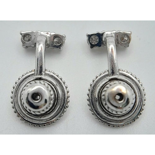 207 - A PAIR OF 18K WHITE GOLD 0.30CT DIAMOND EARRINGS. TOTAL WEIGHT 3.4G. REF BL 6004