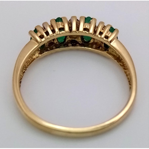 242 - A 18K YELLOW GOLD DIAMOND & EMERALD RING. TOTAL WEIGHT 3.6G. SIZE P. REF BLUND 6002