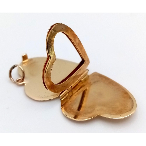 299 - A 9K YELLOW GOLD HEART LOCKET 2.9G TOTAL WEIGHT.

ref: SC 6002