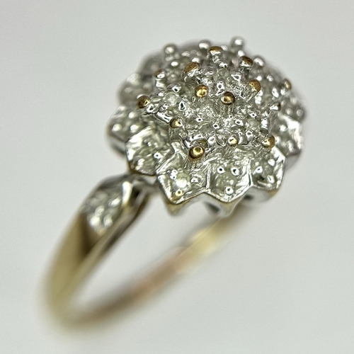 306 - A 9K YELLOW GOLD DIAMOND CLUSTER RING 3.1G TOTAL WEIGHT, SIZE P 1/2.

ref: SC 6003