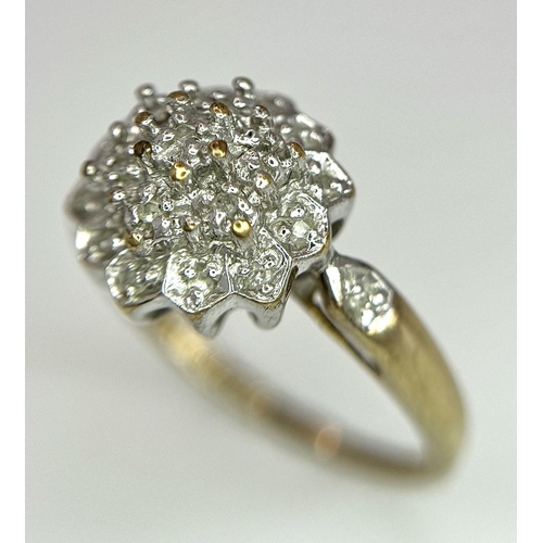 306 - A 9K YELLOW GOLD DIAMOND CLUSTER RING 3.1G TOTAL WEIGHT, SIZE P 1/2.

ref: SC 6003