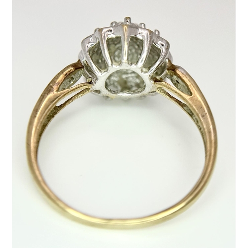 306 - A 9K YELLOW GOLD DIAMOND CLUSTER RING 3.1G TOTAL WEIGHT, SIZE P 1/2.

ref: SC 6003