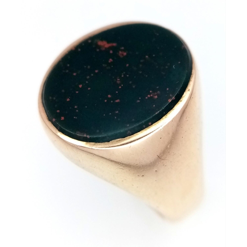 320 - A 9K ROSE GOLD BLOODSTONE SET RING 9.5G TOTAL WEIGHT, SIZE N.

ref: SC 6005