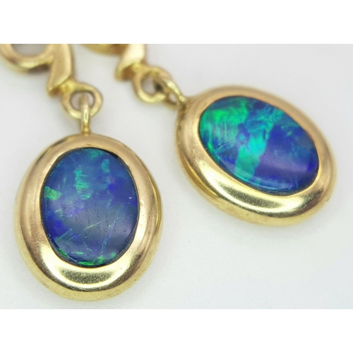 348 - A PAIR OF 14K YELLOW GOLD OPAL SET DROP EARRINGS 2.4G TOTAL WEIGHT, 3CM LENGTH.

ref: SC 6046