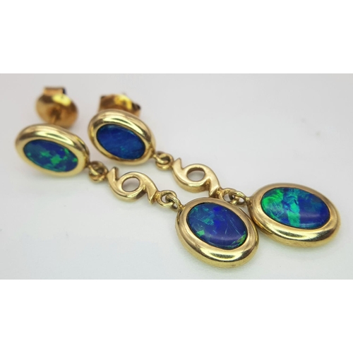 348 - A PAIR OF 14K YELLOW GOLD OPAL SET DROP EARRINGS 2.4G TOTAL WEIGHT, 3CM LENGTH.

ref: SC 6046