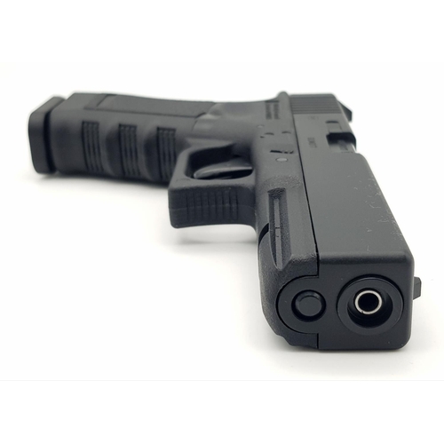 367 - An Excellent Condition Glock 17 Austrian Made CO2 .177 Air Pistol. Blow Back Action. 3 Pellet Holder... 