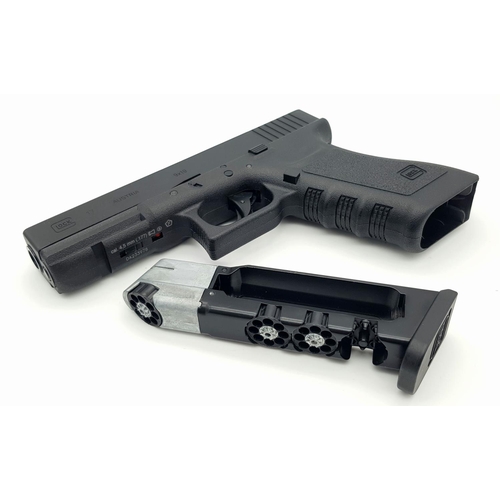 367 - An Excellent Condition Glock 17 Austrian Made CO2 .177 Air Pistol. Blow Back Action. 3 Pellet Holder... 