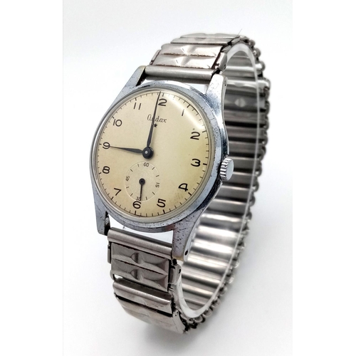 395 - A circa 1940’s Vintage Manual Wind Stainless Steel Officers
Watch by Audax Switzerland. Subsidiary D... 