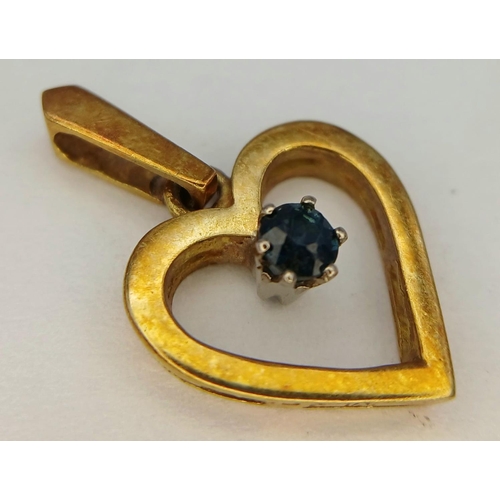 397 - AN 18K YELLOW GOLD SAPHIRE SET HEART PENDANT 1.8G TOTAL WEIGHT.

ref: SC 6058