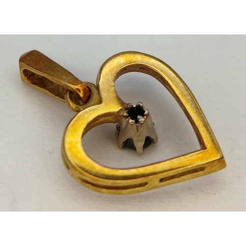 397 - AN 18K YELLOW GOLD SAPHIRE SET HEART PENDANT 1.8G TOTAL WEIGHT.

ref: SC 6058