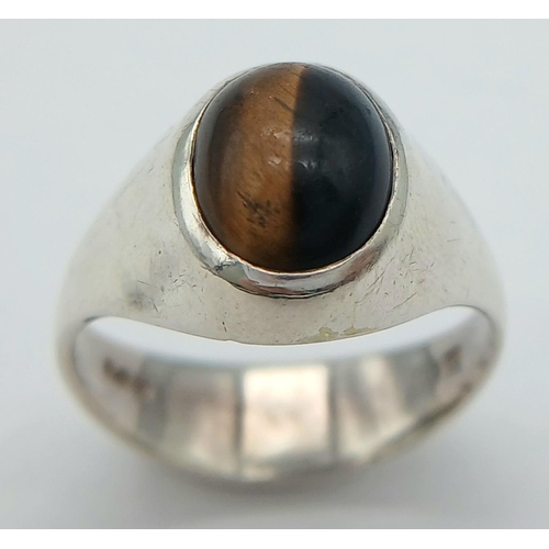 432 - A STERLING SILVER TIGERS EYE RING 4.2G TOTAL WEIGHT, SIZE P. 

ref: SC 6063