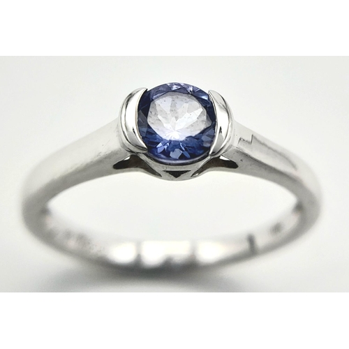 444 - A 10 Carat White Gold Tanzanite Solitaire Ring Size L1/2. Set with a 5mm Round Cut Quality Tanzanite... 