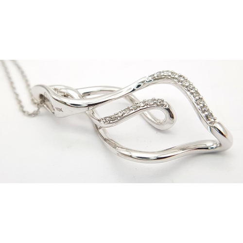 453 - A 9K WHITE GOLD DIAMOND SET SWIRL DESIGN DROP PENDANT ON 9K WHITE GOLD CHAIN 3.3G TOTAL WEIGHT, 46CM... 