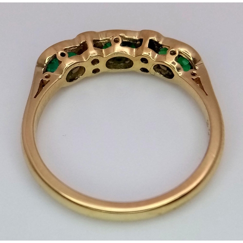 495 - A 18K YELLOW GOLD DIAMOND & EMERALD RING. TOTAL WEIGHT 2.8G. SIZE M. REF BLUND 6003