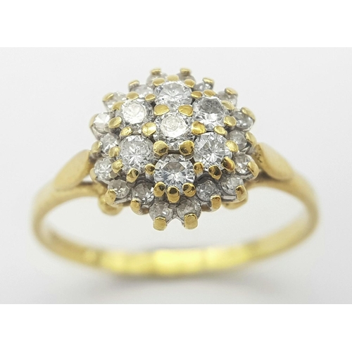 502 - A FANCY 18K YELLOW GOLD 0.45CT DIAMOND CLUSTER RING. TOTAL WEIGHT 2.8G. SIZE O. REF PERS 6002.