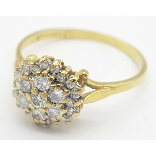 502 - A FANCY 18K YELLOW GOLD 0.45CT DIAMOND CLUSTER RING. TOTAL WEIGHT 2.8G. SIZE O. REF PERS 6002.