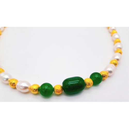 168 - A very feminine cultured pearl necklace, bracelet and earrings set with green jade elements and 9 K ... 