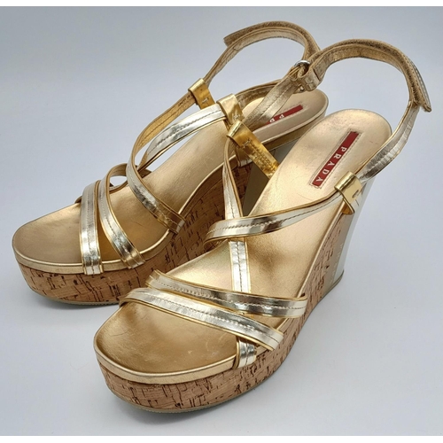 263 - A pair of PRADA  wedges sandals, gold and silver colour,
size 8/39, lightly used, see photos for con... 