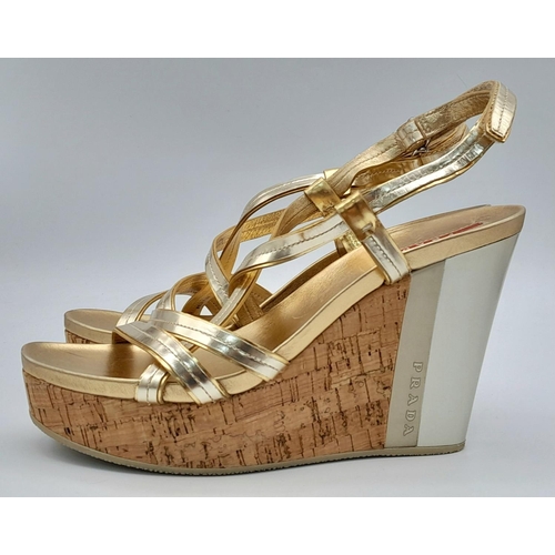 263 - A pair of PRADA  wedges sandals, gold and silver colour,
size 8/39, lightly used, see photos for con... 