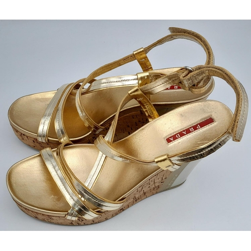 263 - A pair of PRADA  wedges sandals, gold and silver colour,
size 8/39, lightly used, see photos for con... 