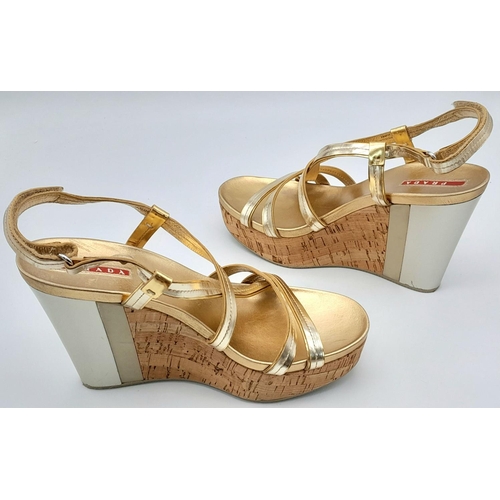 263 - A pair of PRADA  wedges sandals, gold and silver colour,
size 8/39, lightly used, see photos for con... 