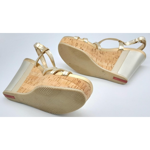 263 - A pair of PRADA  wedges sandals, gold and silver colour,
size 8/39, lightly used, see photos for con... 