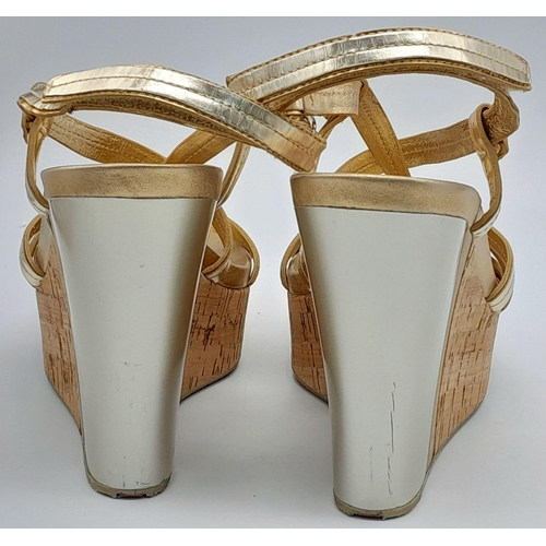 263 - A pair of PRADA  wedges sandals, gold and silver colour,
size 8/39, lightly used, see photos for con... 