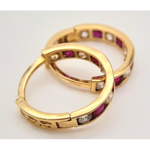 579 - A 14K YELLOW GOLD STONE SET MINI HOOP EARRINGS 1.6G TOTAL WEIGHT, 1CM DIAMETER.

ref: SC 6049