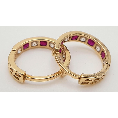 579 - A 14K YELLOW GOLD STONE SET MINI HOOP EARRINGS 1.6G TOTAL WEIGHT, 1CM DIAMETER.

ref: SC 6049