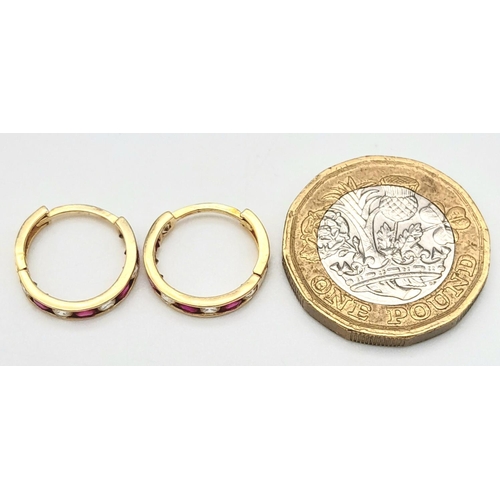 579 - A 14K YELLOW GOLD STONE SET MINI HOOP EARRINGS 1.6G TOTAL WEIGHT, 1CM DIAMETER.

ref: SC 6049