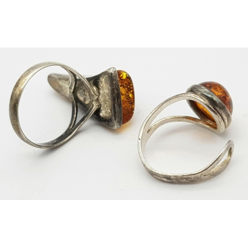 663 - 2 X STERLING SILVER AMBER SET RINGS. 6.7G IN TOTAL WEIGHT. SIZES L AND O 1/2.
Ref: SC 8003.