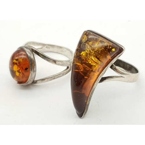 663 - 2 X STERLING SILVER AMBER SET RINGS. 6.7G IN TOTAL WEIGHT. SIZES L AND O 1/2.
Ref: SC 8003.