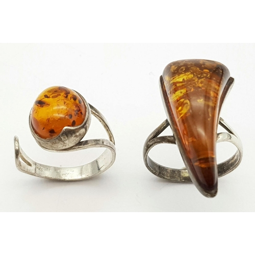 663 - 2 X STERLING SILVER AMBER SET RINGS. 6.7G IN TOTAL WEIGHT. SIZES L AND O 1/2.
Ref: SC 8003.