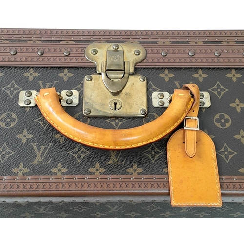 227 - A Vintage Louis Vuitton Trunk/Suitcase. Monogram canvas and brown leather trim exterior. Brass corne... 