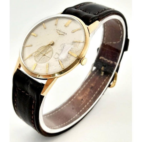 125 - Gentlemans 1960’s Vintage 9 carat GOLD LONGINES WRISTWATCH. Manual winding in full working order. In... 