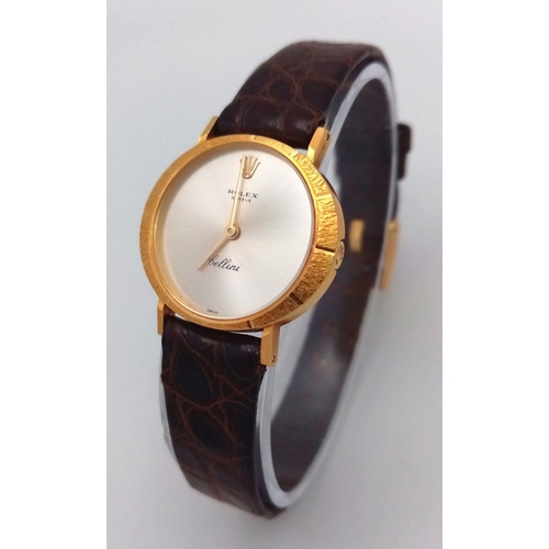 148 - A LADIES 18K GOLD ROLEX CELLINI WITH MOTHER OF PEARL DIAL AND ON A BROWN CROCODILE STRAP , ONE OF TH... 