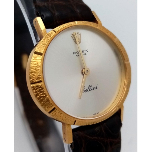 148 - A LADIES 18K GOLD ROLEX CELLINI WITH MOTHER OF PEARL DIAL AND ON A BROWN CROCODILE STRAP , ONE OF TH... 