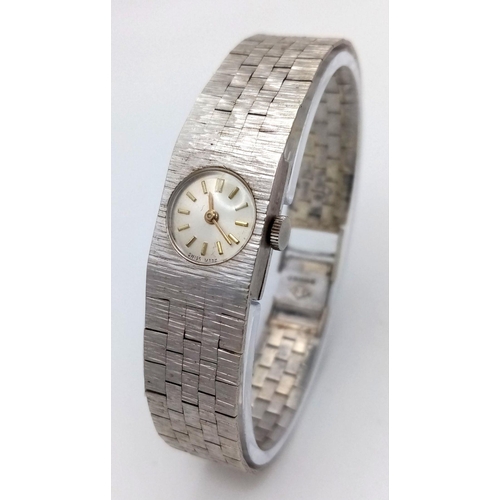 18 - A VINTAGE 9K WHITE GOLD WATCH (OVERWOUND)   32.4gms