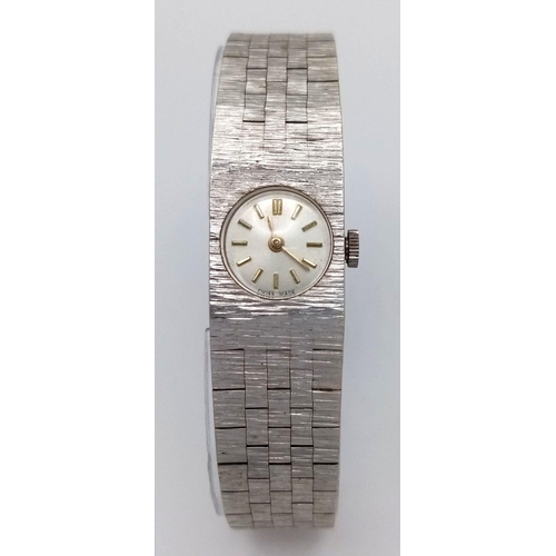 18 - A VINTAGE 9K WHITE GOLD WATCH (OVERWOUND)   32.4gms