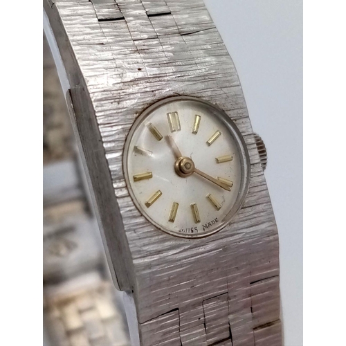 18 - A VINTAGE 9K WHITE GOLD WATCH (OVERWOUND)   32.4gms