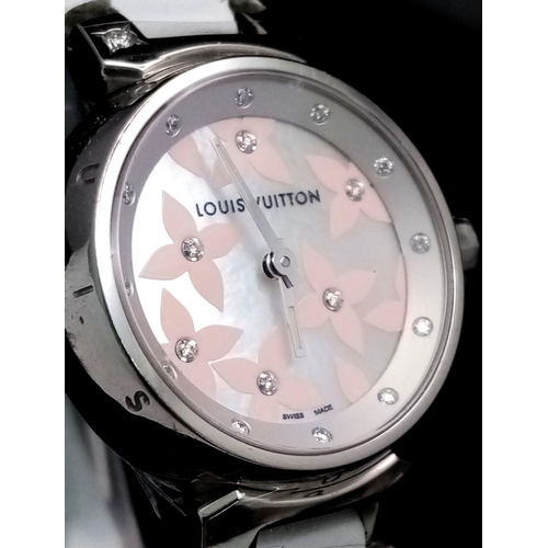 206 - A LOUIS VUITTON LADIES WATCH IN STAINLESS STEEL WITH DIAMOND NUMERALS AND DECORATION .    28mm