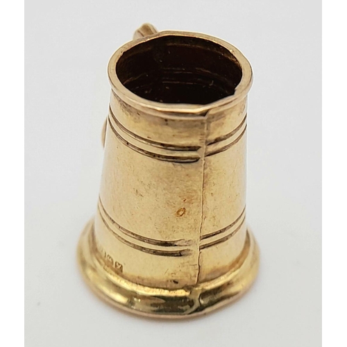 244 - 9 carat GOLD TANKARD CHARM. Full UK hallmark. 1.35 grams.