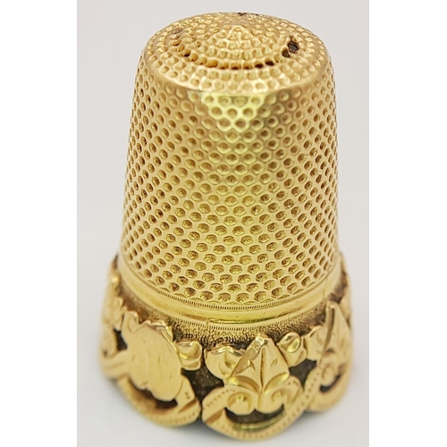 25 - A 9K GOLD ORNATE THIMBLE .     6.1gms