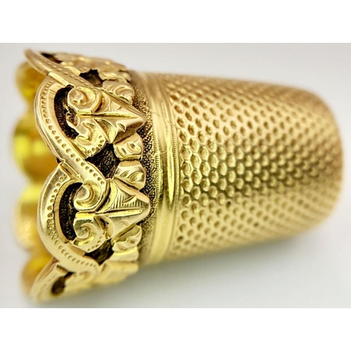 25 - A 9K GOLD ORNATE THIMBLE .     6.1gms