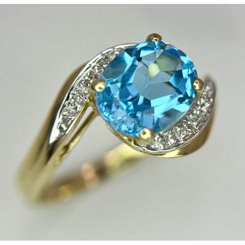 260 - A Very Good Quality, Hallmarked 1998, 9 Carat Yellow Gold Blue Topaz and Diamond Set Ring Size P. Se... 