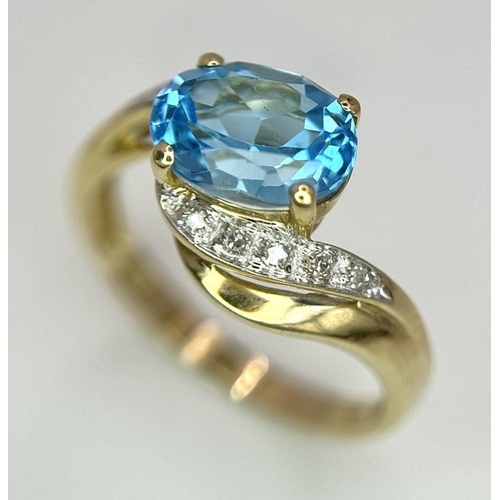 260 - A Very Good Quality, Hallmarked 1998, 9 Carat Yellow Gold Blue Topaz and Diamond Set Ring Size P. Se... 