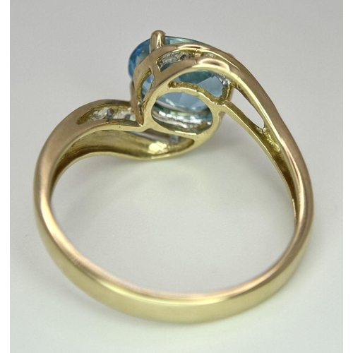 260 - A Very Good Quality, Hallmarked 1998, 9 Carat Yellow Gold Blue Topaz and Diamond Set Ring Size P. Se... 